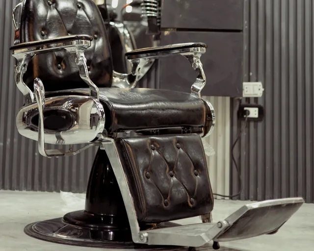 Leather barber chair in a dark room