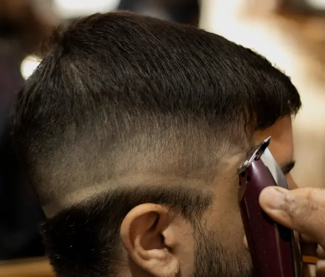 Side view of a clean fade haircut